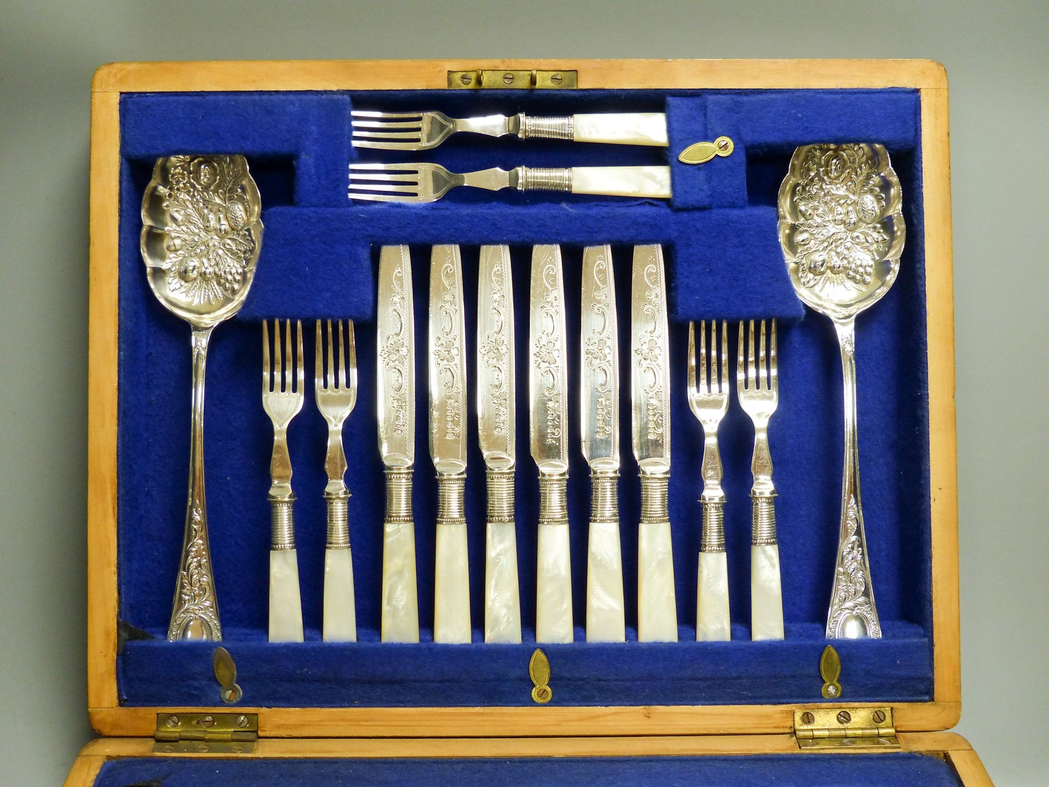 A mahogany cased silver plated dessert set